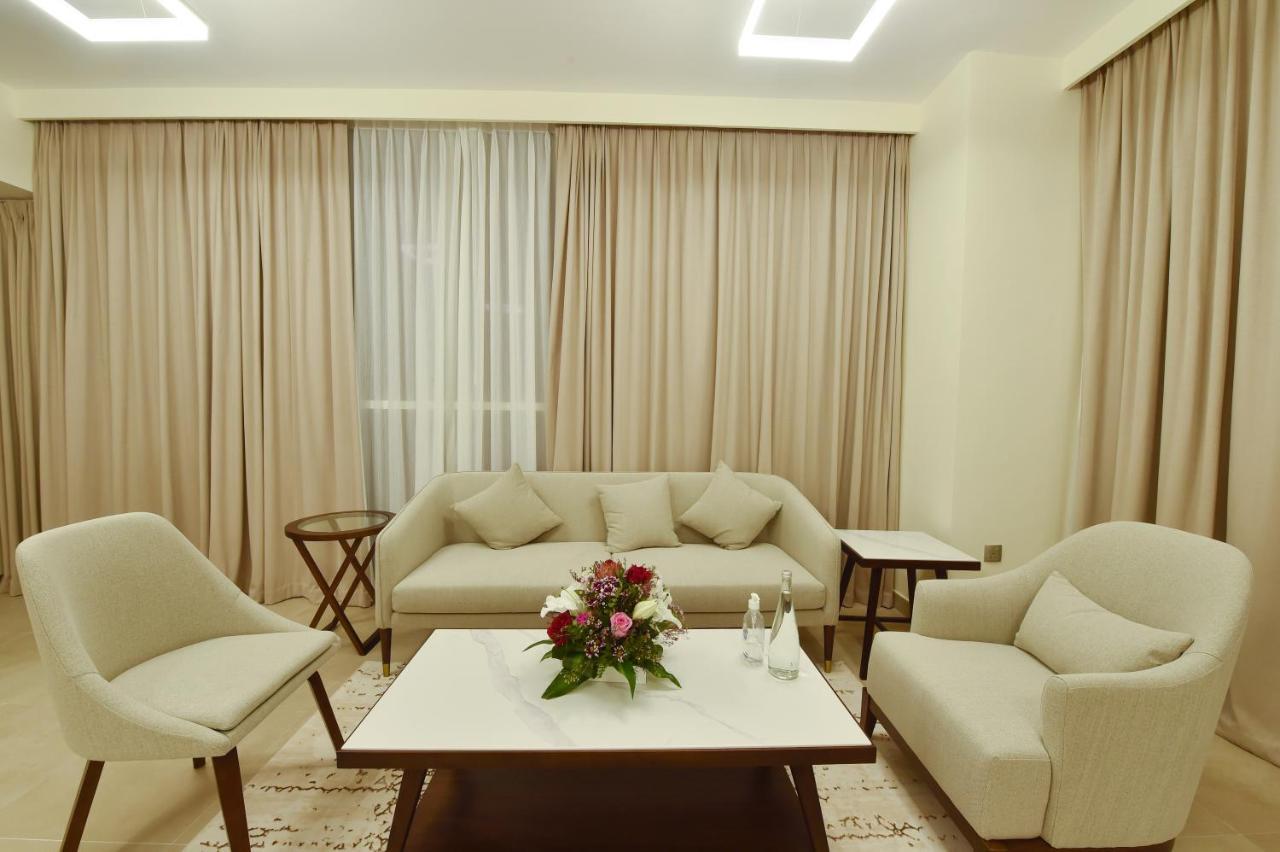 Saray Deluxe Hotel Apartments Abú Dhabí Exteriér fotografie A living room