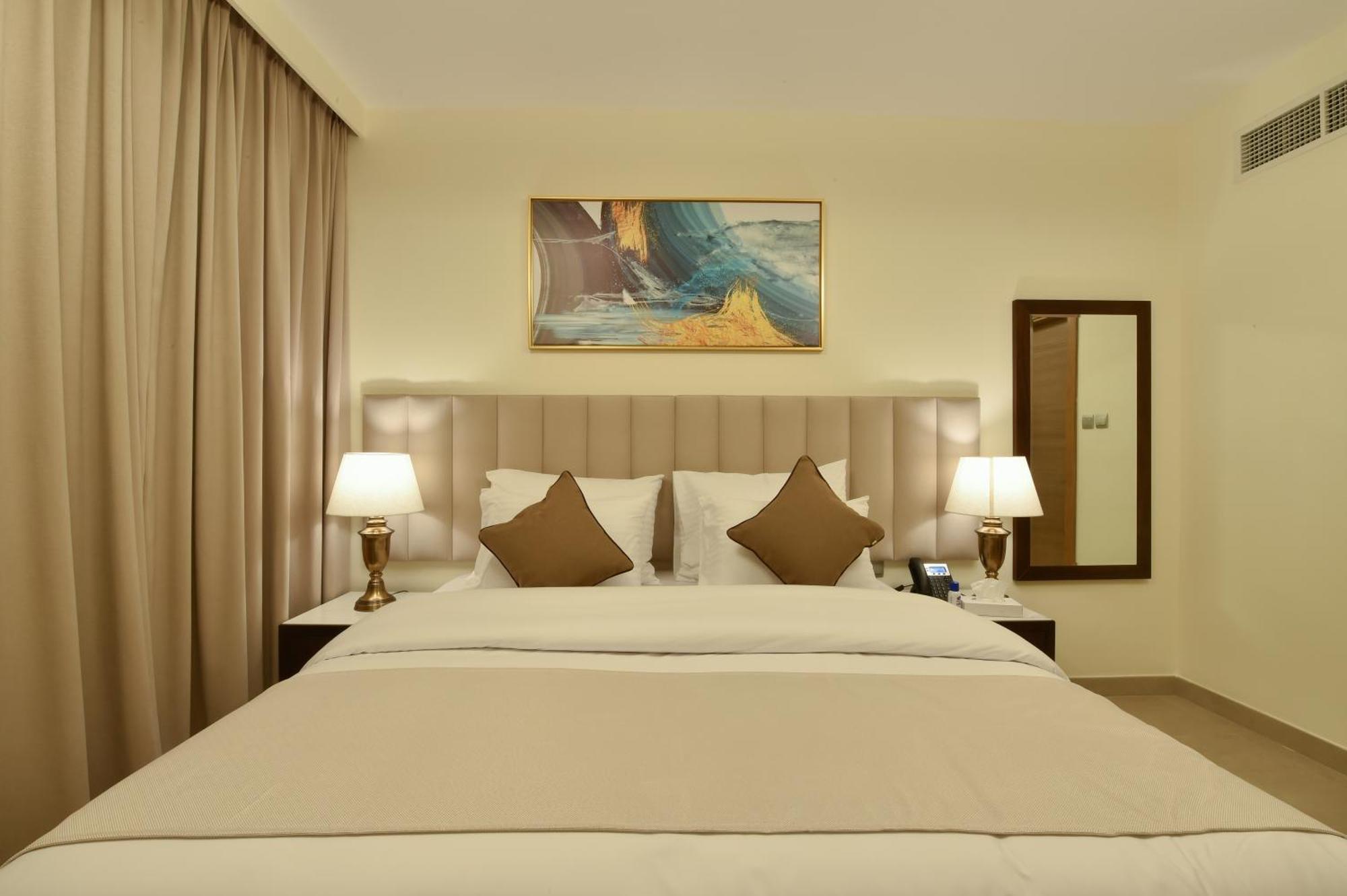 Saray Deluxe Hotel Apartments Abú Dhabí Pokoj fotografie A bedroom at the hotel